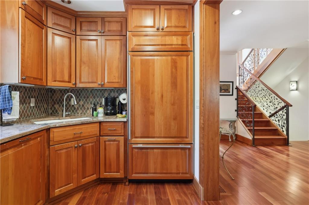 542 North Monroe Street Butler, PA 16001 - Photo 6 of 39 a view of a kitchen with wooden floor and staircase