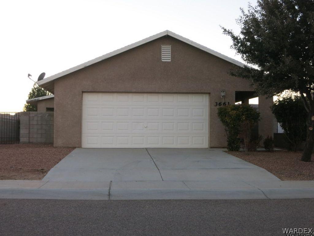 3661 North Kenneth Road Kingman, AZ 86409 - Photo 18 of 18 a front view of house with garage