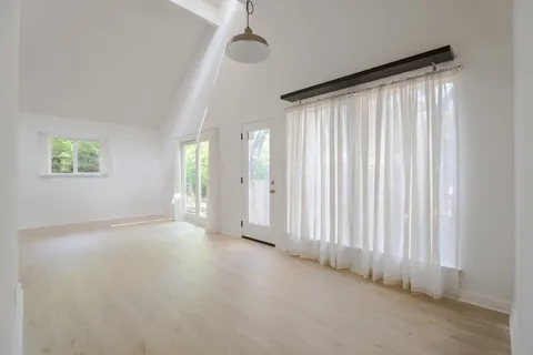 an empty room with windows