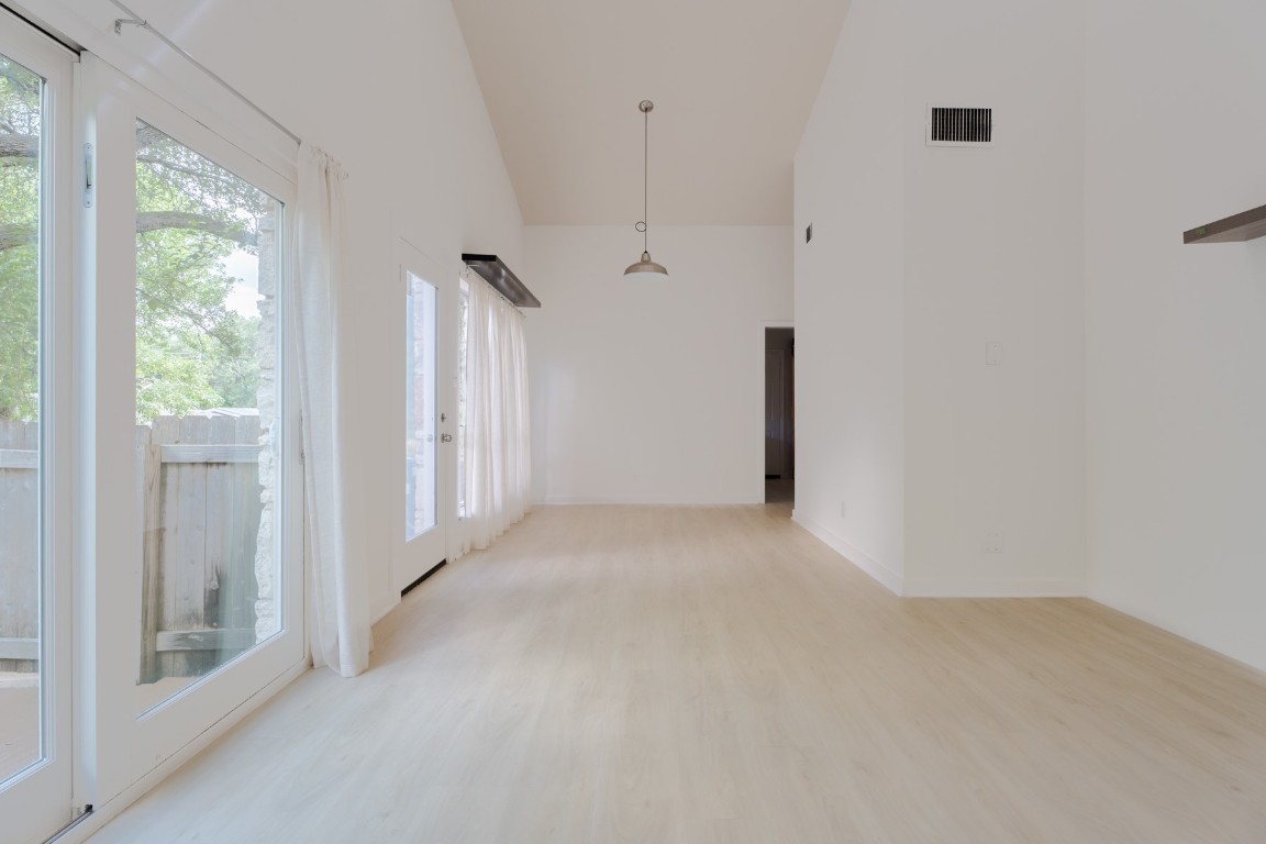 3301 Doolin Drive Austin, TX 78704 - Photo 18 of 32 a view of a hallway with a white walls