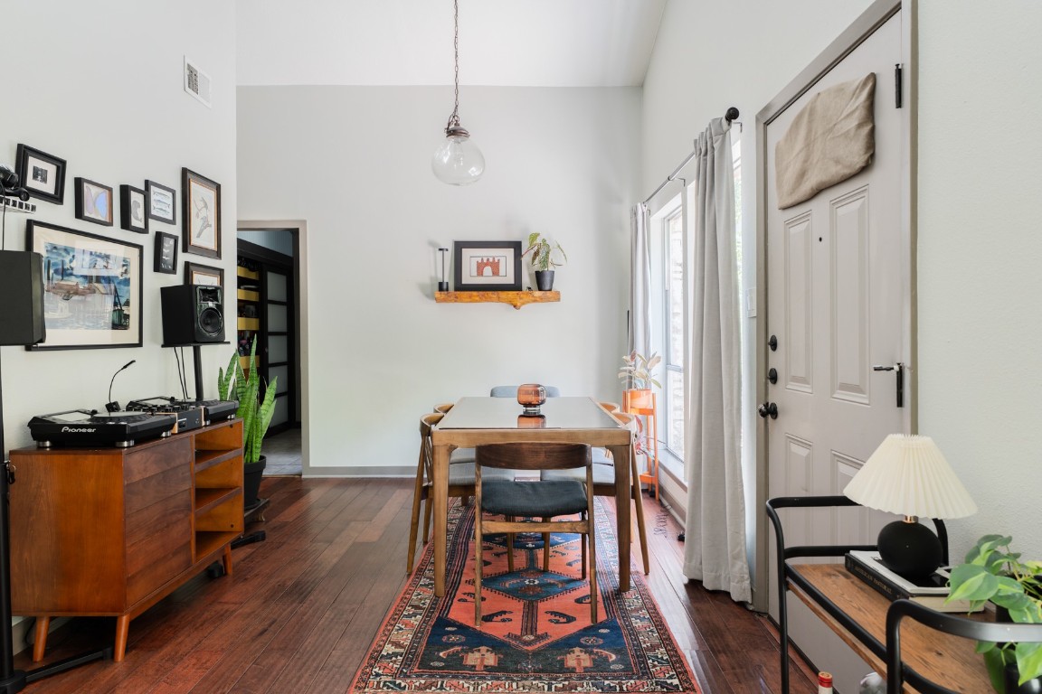 3301 Doolin Drive Austin, TX 78704 - Photo 2 of 32 a workspace with furniture and wooden floor