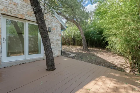 a view of a tree in front of a house