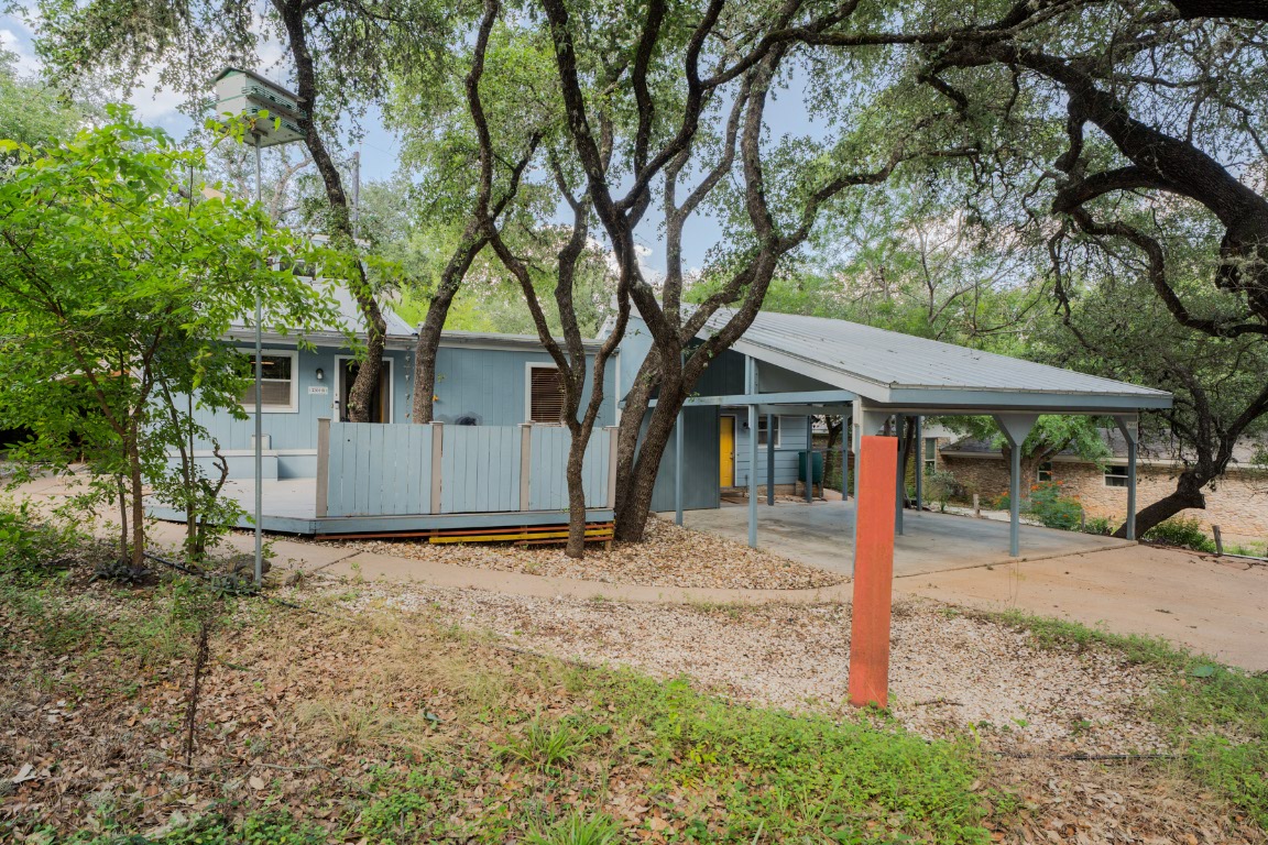 3301 Doolin Drive Austin, TX 78704 - Photo 28 of 32 a house with a tree in front of the house