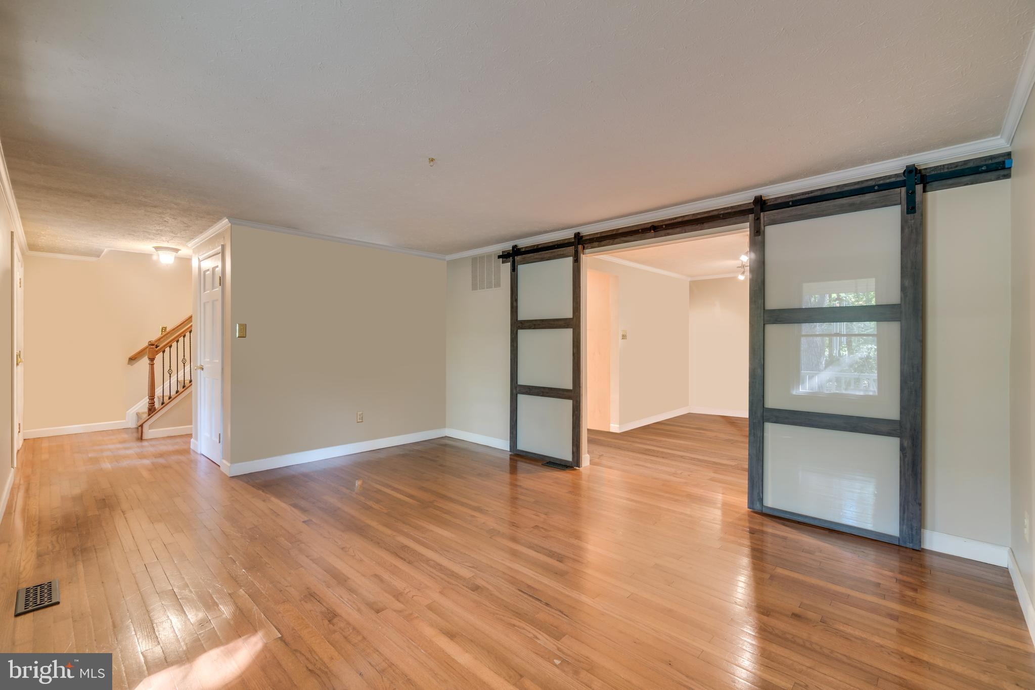 2287 Archdale Road Reston, VA 20191 - Photo 9 of 24 Formal Living Room with doors into Dining