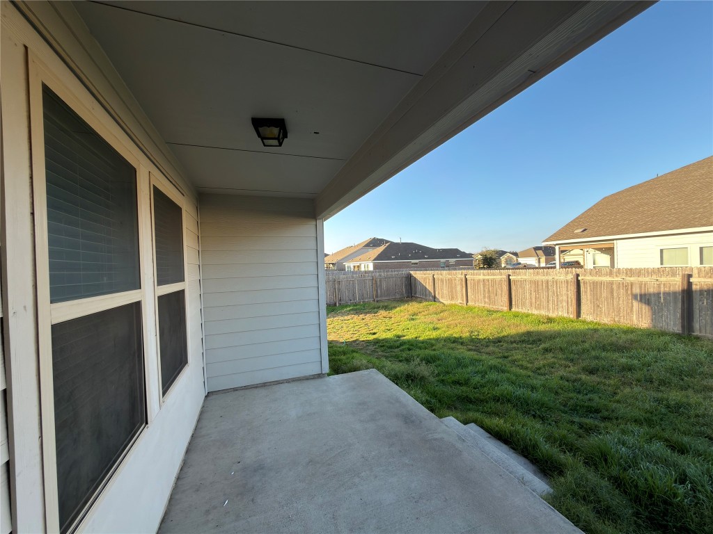 21700 Urraca Lane Pflugerville, TX 78660 - Photo 22 of 40 a view of a back yard of the house