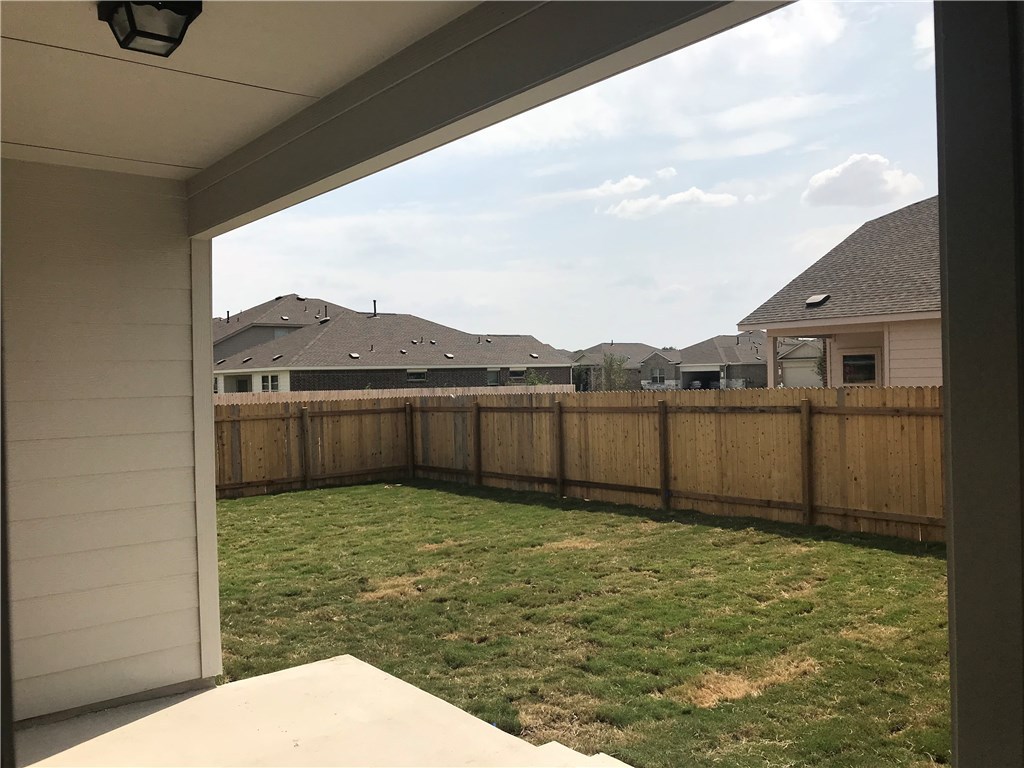 21700 Urraca Lane Pflugerville, TX 78660 - Photo 27 of 40 a view of a backyard