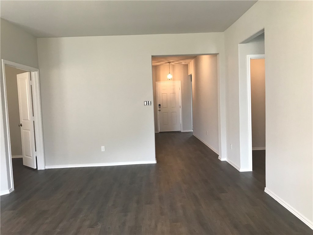 21700 Urraca Lane Pflugerville, TX 78660 - Photo 40 of 40 a view of a room with wooden floor