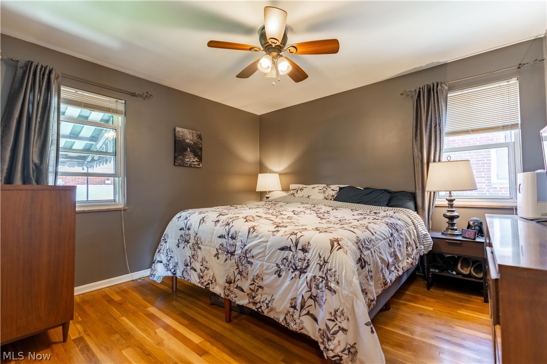 8320 Ackley Road Parma, OH 44129 - Photo 6 of 36 Bedroom featuring ceiling fan and hardwood / wood-style flooring