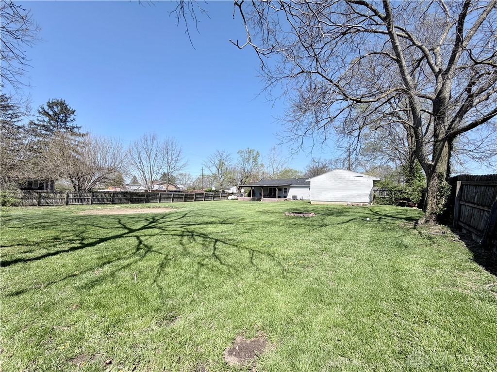 6800 Farmington Road Miamisburg, OH 45342 - Photo 28 of 32 Expansive outdoor living awaits in this generously sized, private yard with mature trees.
