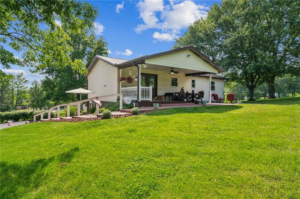 922 Old Ridge Road Avella, PA 15312 - Photo 12 of 50 a front view of a house with patio