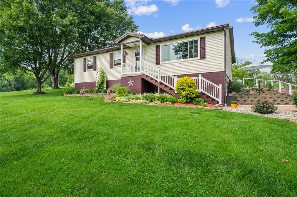 922 Old Ridge Road Avella, PA 15312 - Photo 13 of 50 a view of house with a yard