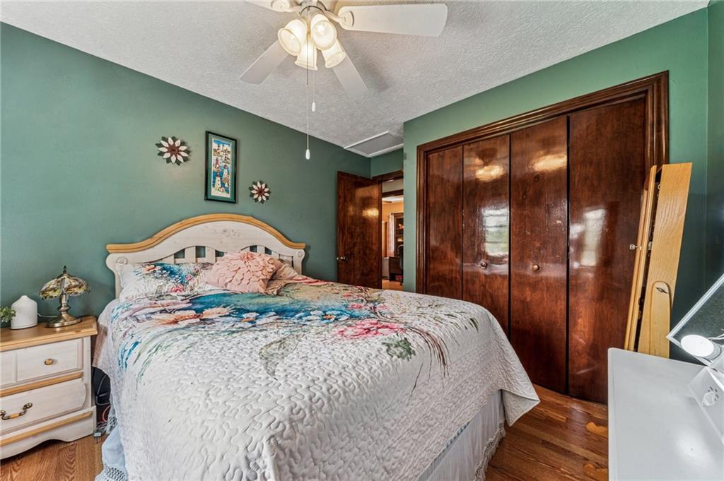 922 Old Ridge Road Avella, PA 15312 - Photo 28 of 50 a large bed sitting in a bedroom next to a window