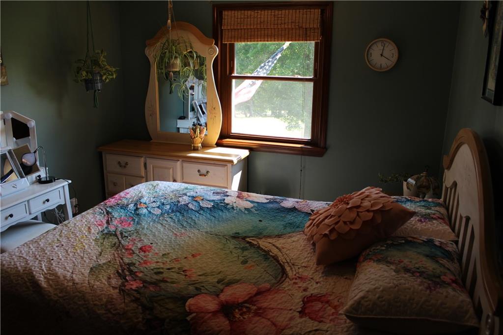 922 Old Ridge Road Avella, PA 15312 - Photo 42 of 50 a bed sitting in a bedroom next to a window