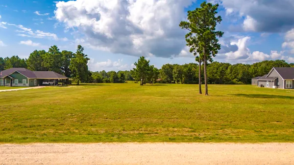 a view of an ocean with a houses