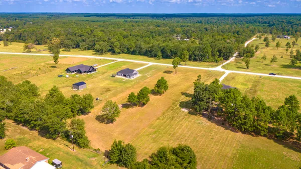 a view of a swimming pool with an ocean view