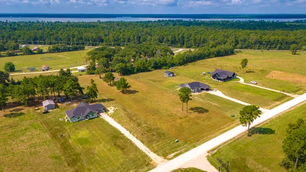 a view of a swimming pool and lake view