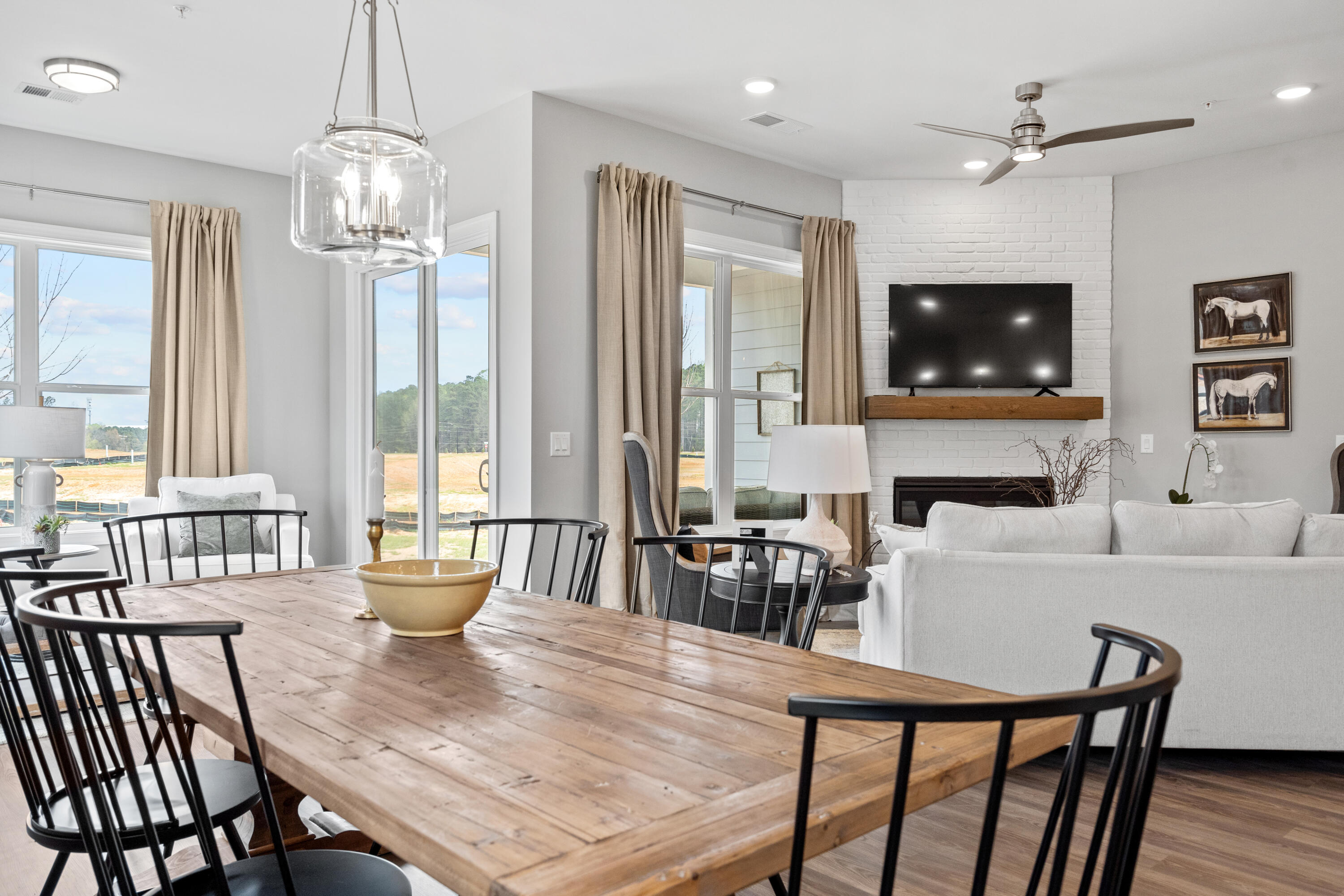 310 Channel Shl Drive, Unit LOT 13 Santa Rosa Beach, FL 32459 - Photo 21 of 77 a living room with furniture a flat screen tv and a fireplace