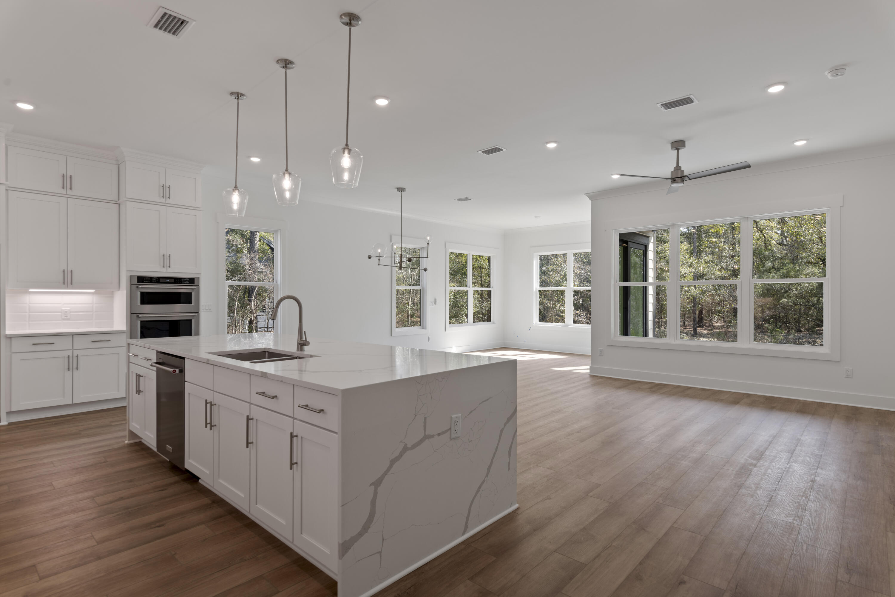 310 Channel Shl Drive, Unit LOT 13 Santa Rosa Beach, FL 32459 - Photo 23 of 77 a large kitchen with stainless steel appliances kitchen island a large island in the center