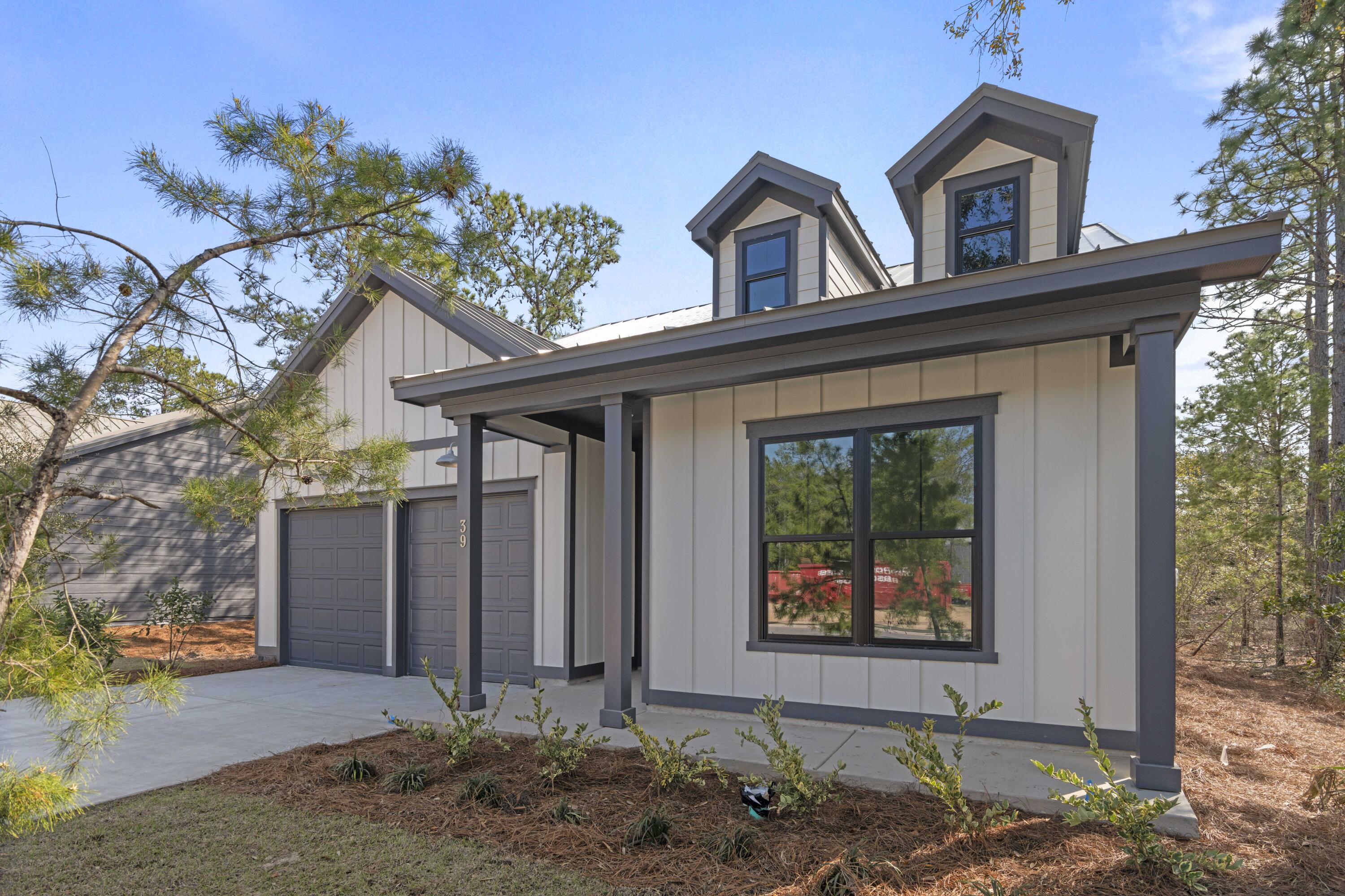 310 Channel Shl Drive, Unit LOT 13 Santa Rosa Beach, FL 32459 - Photo 3 of 77 a front view of house with yard