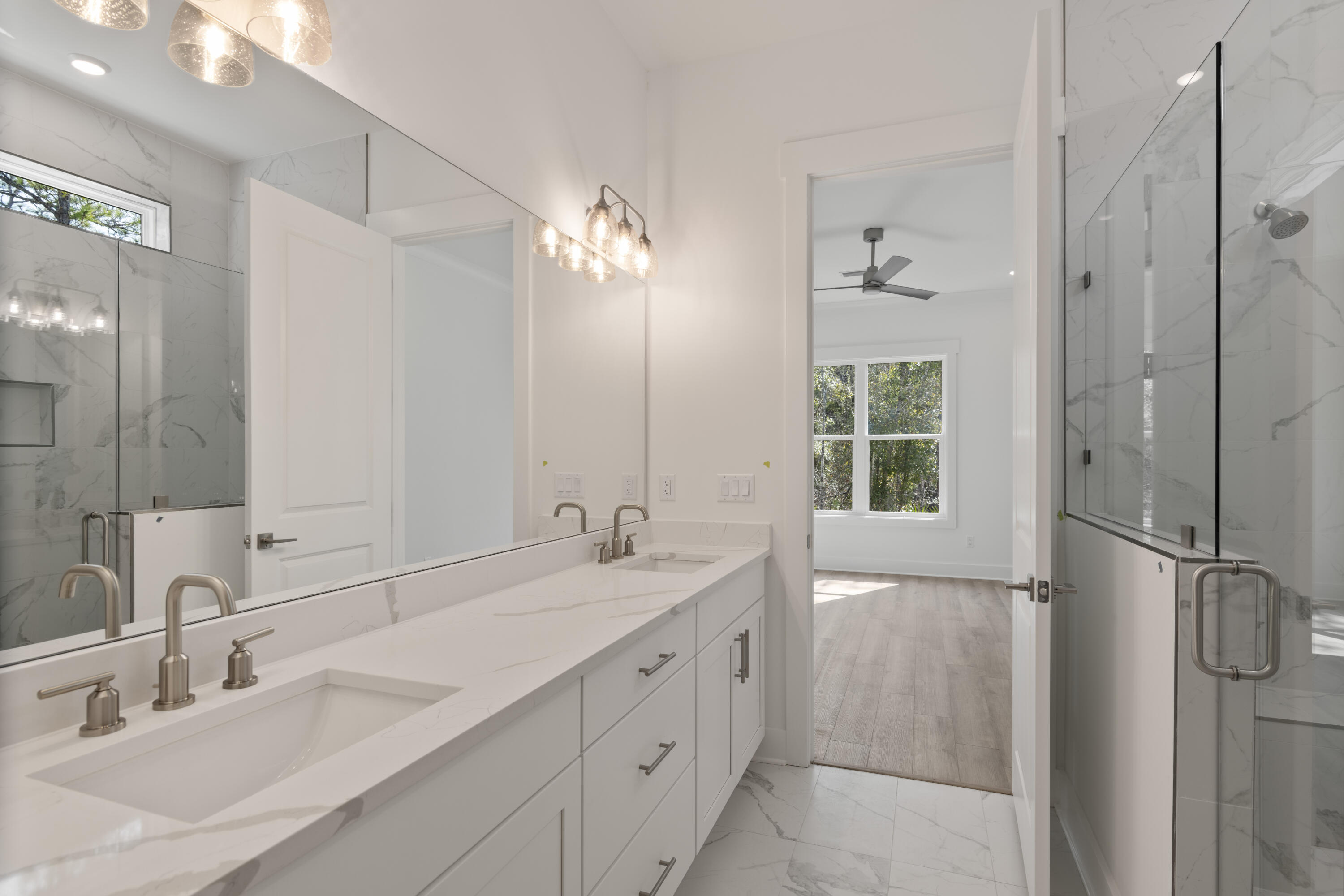 310 Channel Shl Drive, Unit LOT 13 Santa Rosa Beach, FL 32459 - Photo 48 of 77 a bathroom with a double vanity sink mirror and double