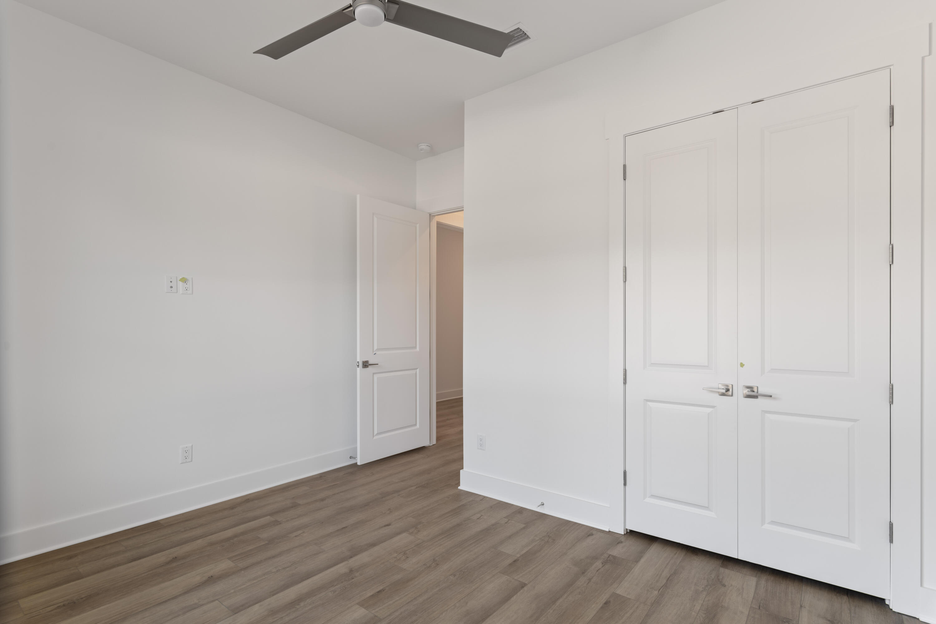 310 Channel Shl Drive, Unit LOT 13 Santa Rosa Beach, FL 32459 - Photo 63 of 77 an empty room with wooden floor