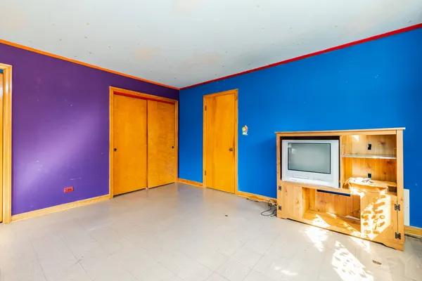 a bathroom with a sink toilet and mirror