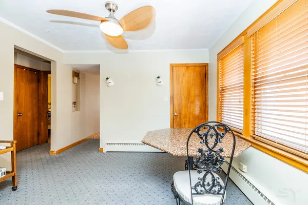 a view of a room with a large window