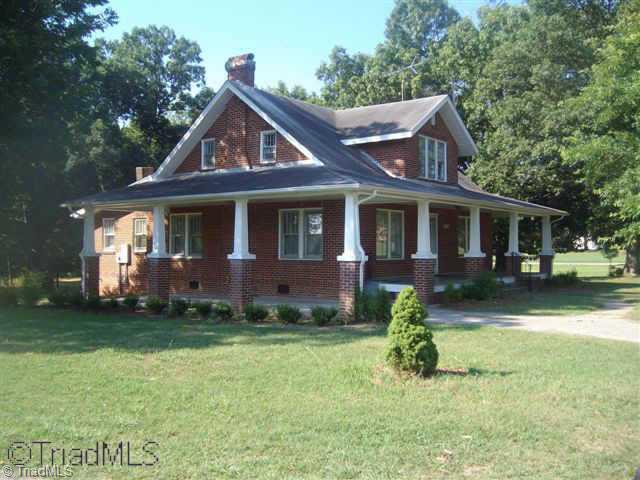 2108 Worsham Mill Road Ruffin, NC 27326 - Photo 1 of 9 Exterior Front. Front view of home surrounded by mature oak trees
