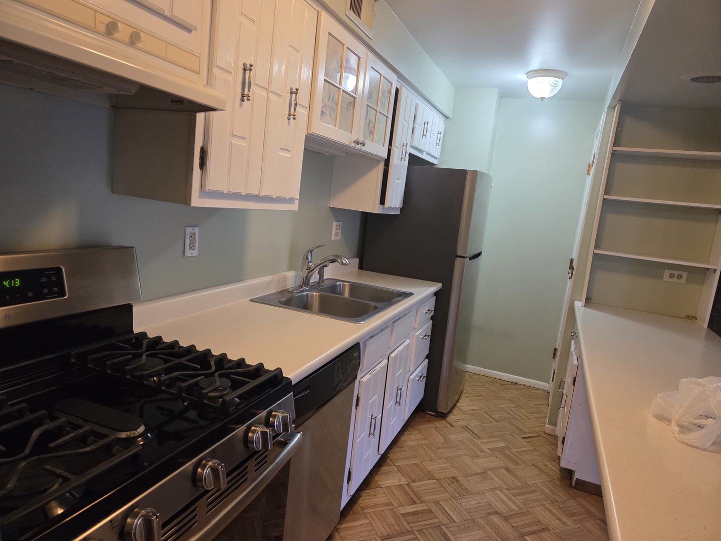 528 East Main Street Barrington, IL 60010 - Photo 7 of 18 a kitchen with sink stove and cabinets