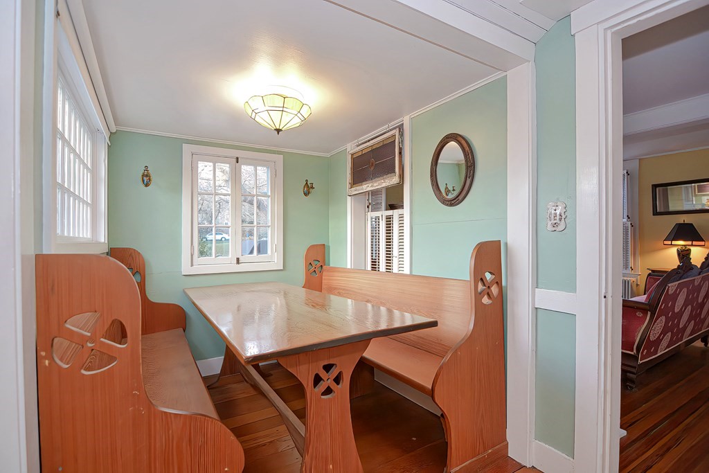 1919 Main Road Westport, MA 02791 - Photo 24 of 42 a view of a dining room with furniture and a window