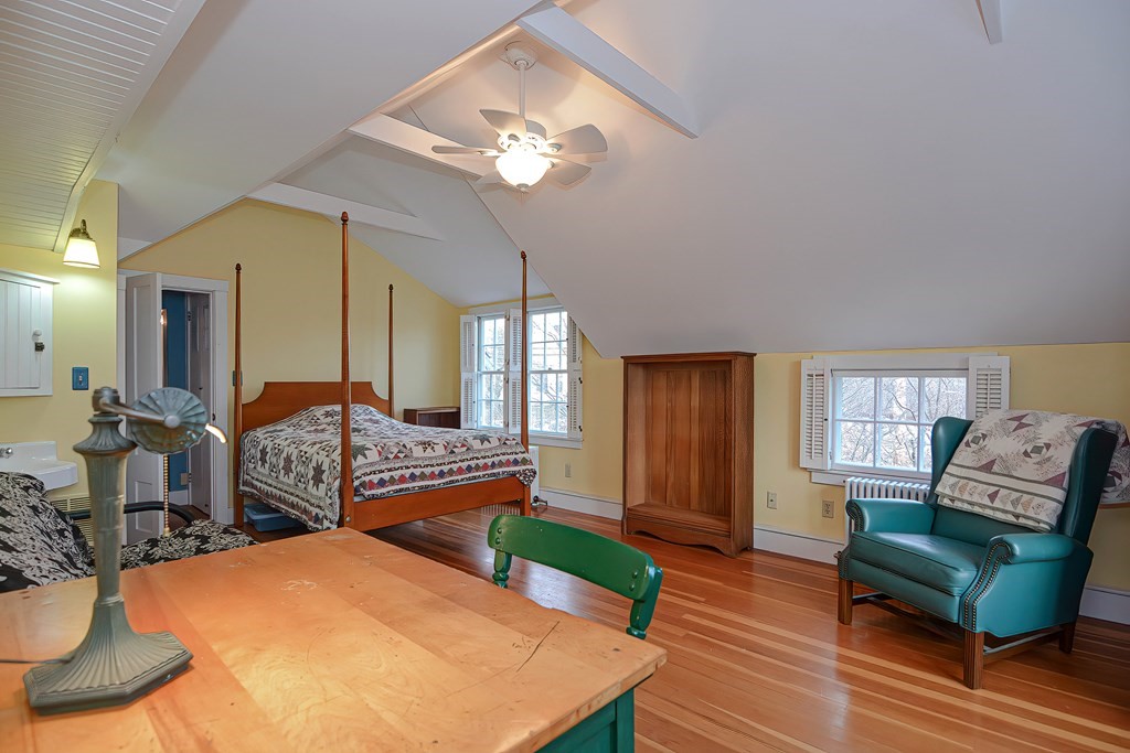 1919 Main Road Westport, MA 02791 - Photo 30 of 42 a living room with furniture and a chandelier