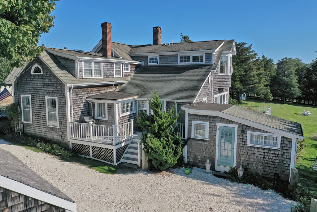 1919 Main Road Westport, MA 02791 - Photo 3 of 42 a front view of a house with garden