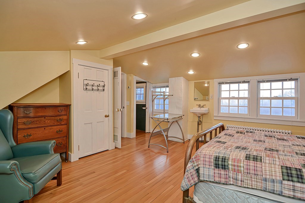 1919 Main Road Westport, MA 02791 - Photo 32 of 42 a spacious bedroom with a bed and furniture