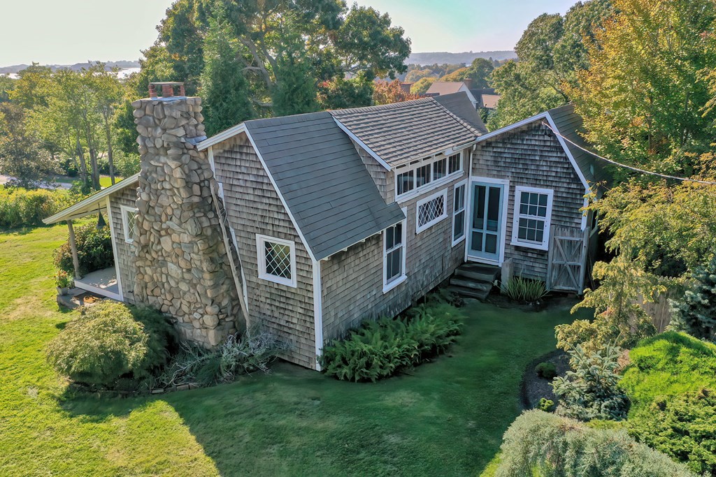 1919 Main Road Westport, MA 02791 - Photo 4 of 42 a aerial view of a house next to a big yard and large trees