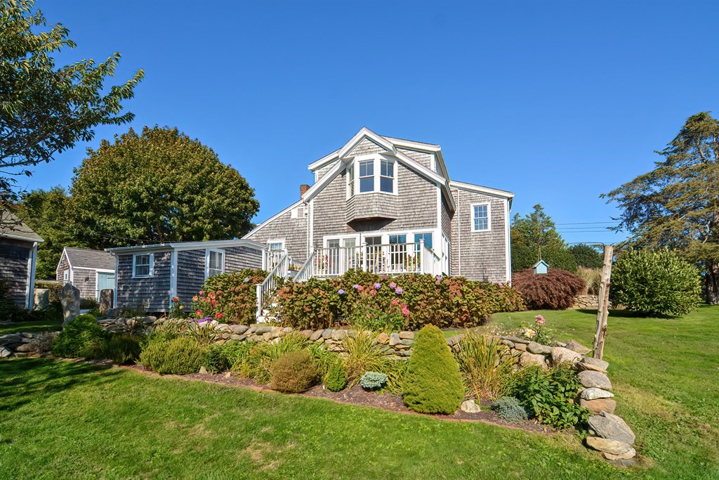 1919 Main Road Westport, MA 02791 - Photo 6 of 42 a front view of a house with garden
