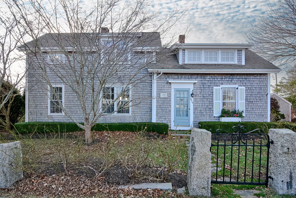 1919 Main Road Westport, MA 02791 - Photo 8 of 42 a view of a brick house with large windows