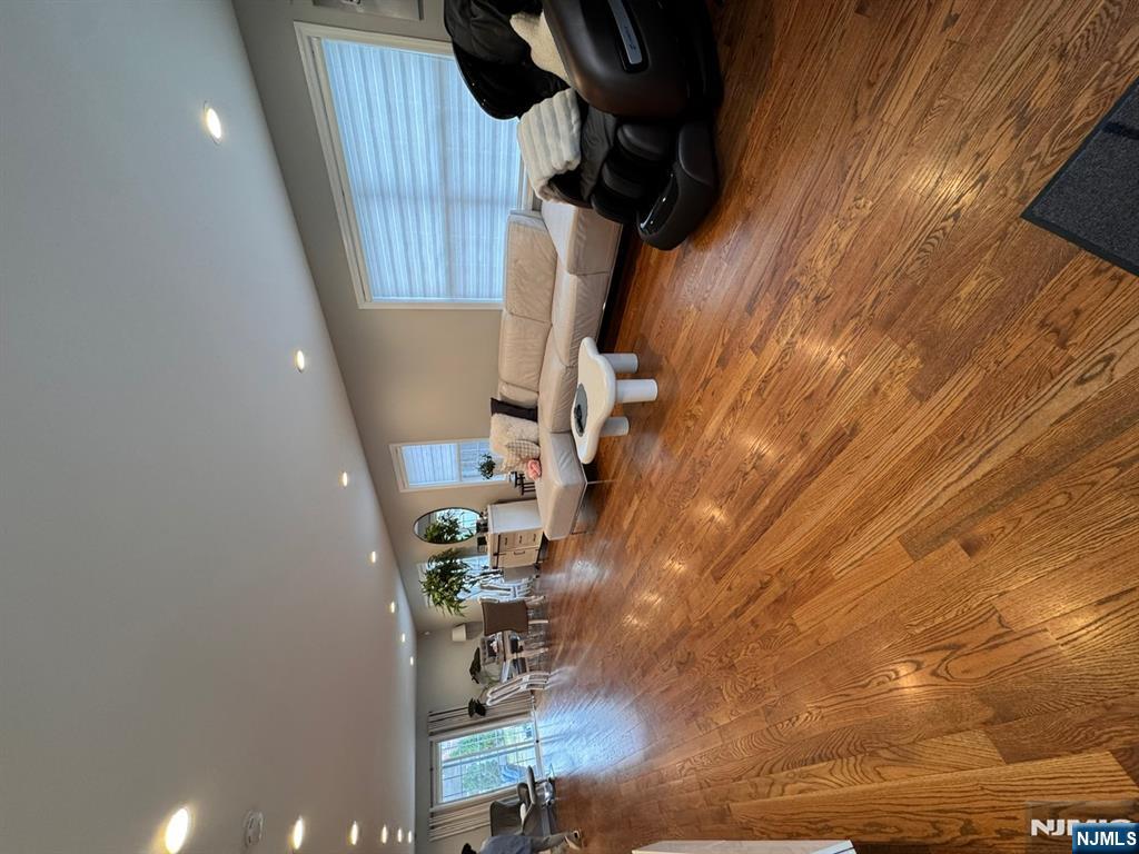 258 Hirliman Road Englewood, NJ 07631 - Photo 4 of 31 a living room with furniture and a wooden floor