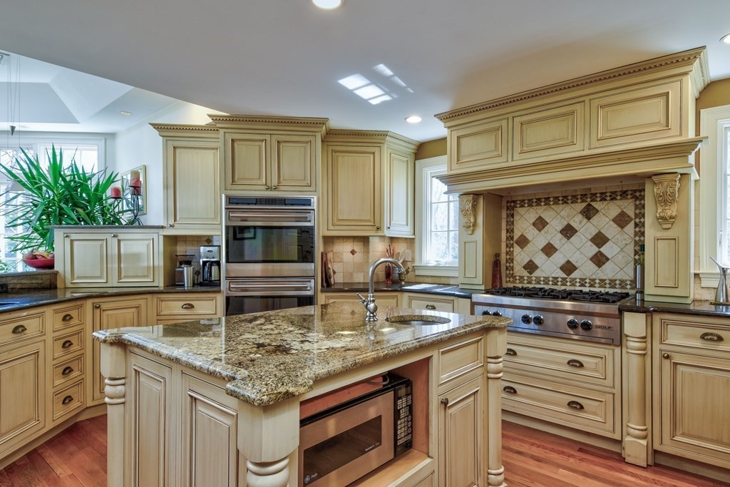 9 Salem Road Wellesley, MA 02481 - Photo 11 of 40 a kitchen with cabinets appliances and a counter space