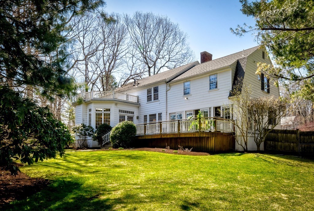 9 Salem Road Wellesley, MA 02481 - Photo 3 of 40 a front view of a house with garden