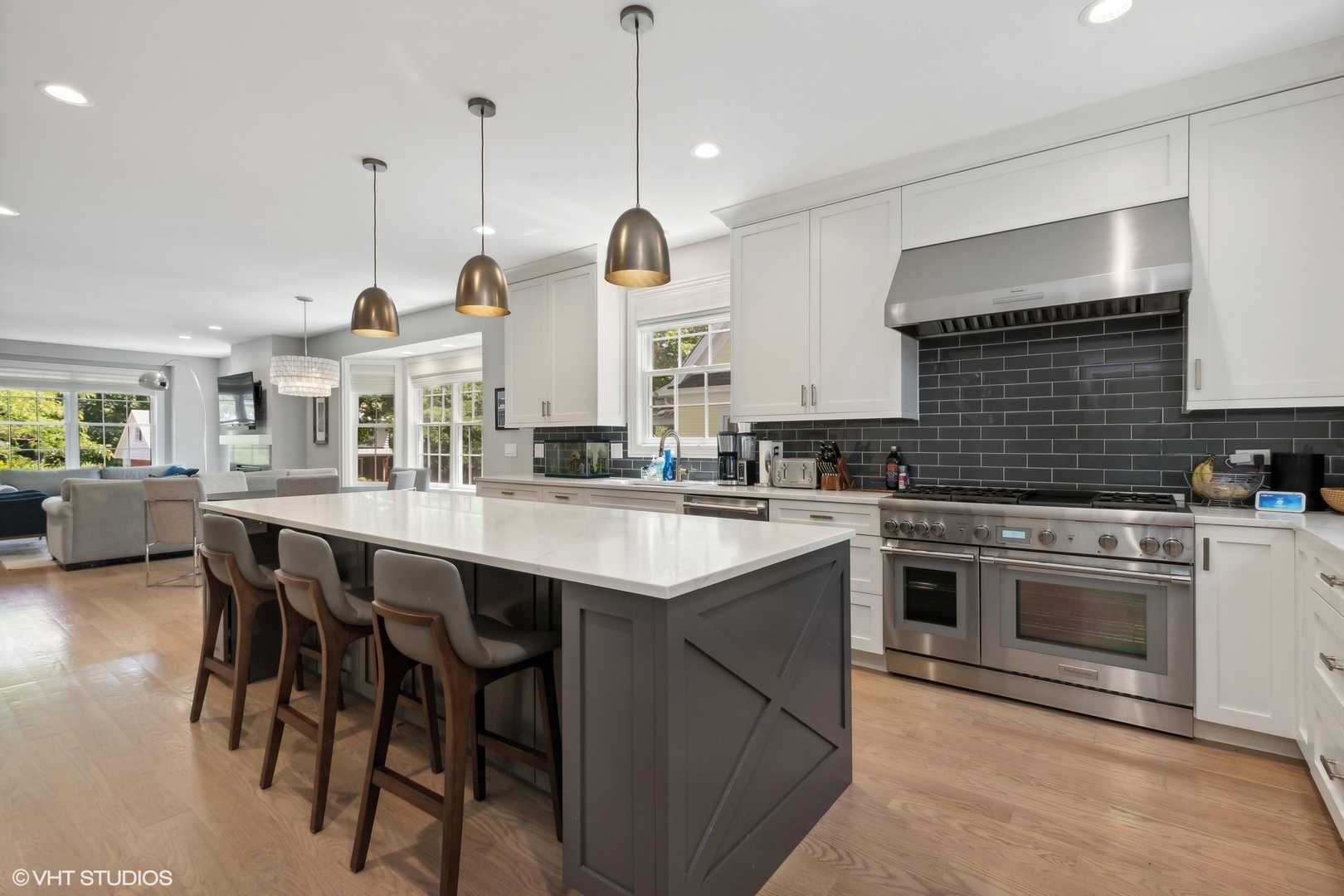 1192 Griffith Road Lake Forest, IL 60045 - Photo 11 of 29 a kitchen with stainless steel appliances granite countertop a stove a sink a oven a dining table and chairs