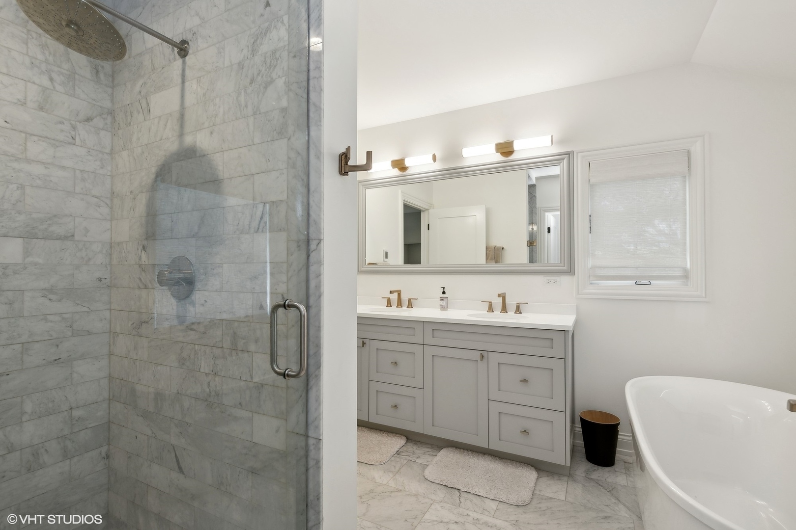 1192 Griffith Road Lake Forest, IL 60045 - Photo 15 of 29 a bathroom with a double vanity sink mirror and bathtub