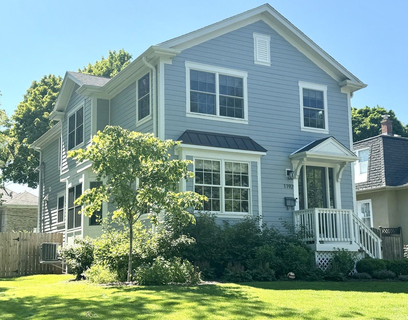 1192 Griffith Road Lake Forest, IL 60045 - Photo 3 of 29 a front view of a house with yard and green space