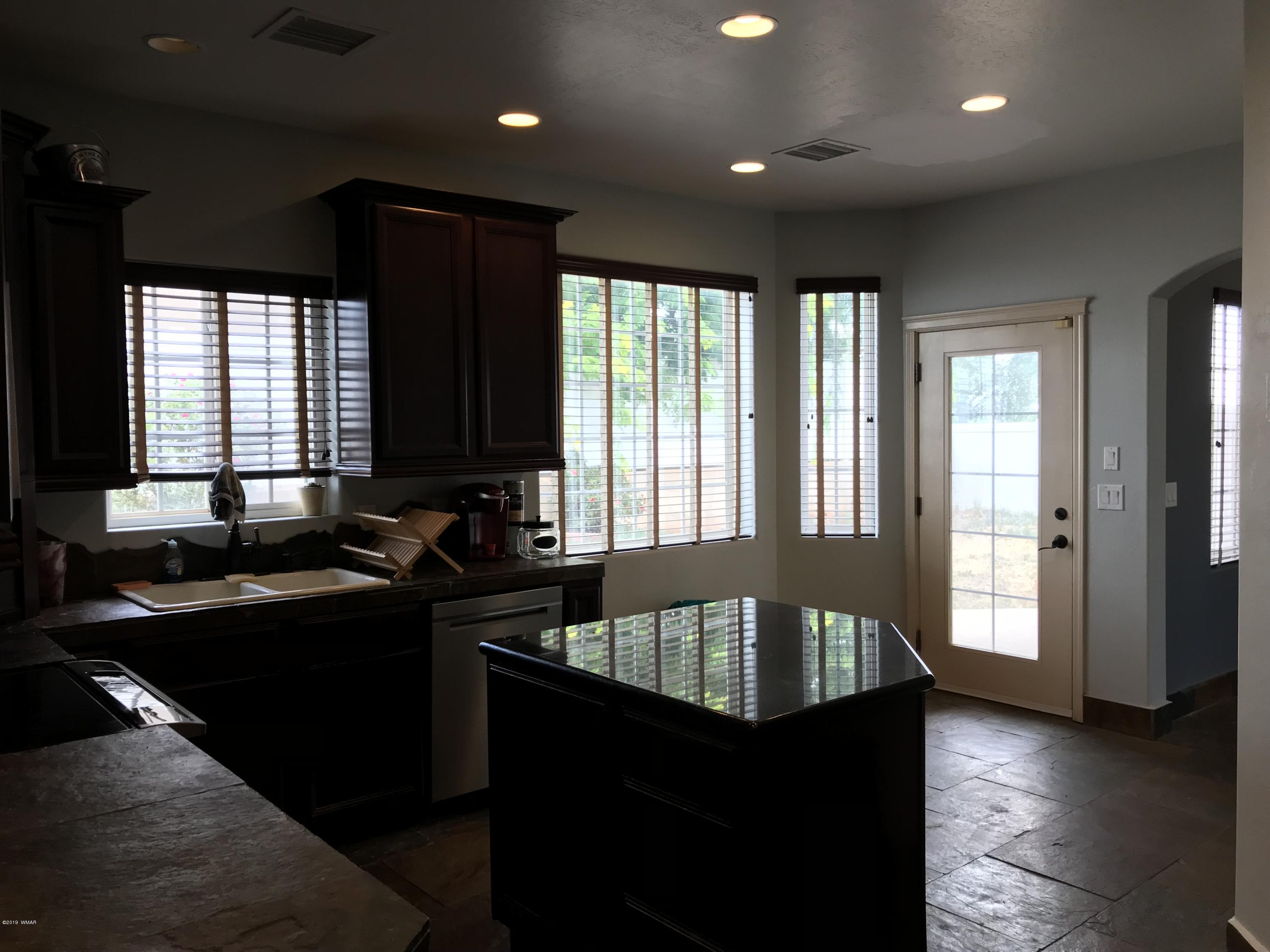 526 South 6th W Street Snowflake, AZ 85937 - Photo 15 of 36 a kitchen with a sink and large window