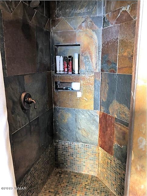 526 South 6th W Street Snowflake, AZ 85937 - Photo 29 of 36 a bathroom with a shower