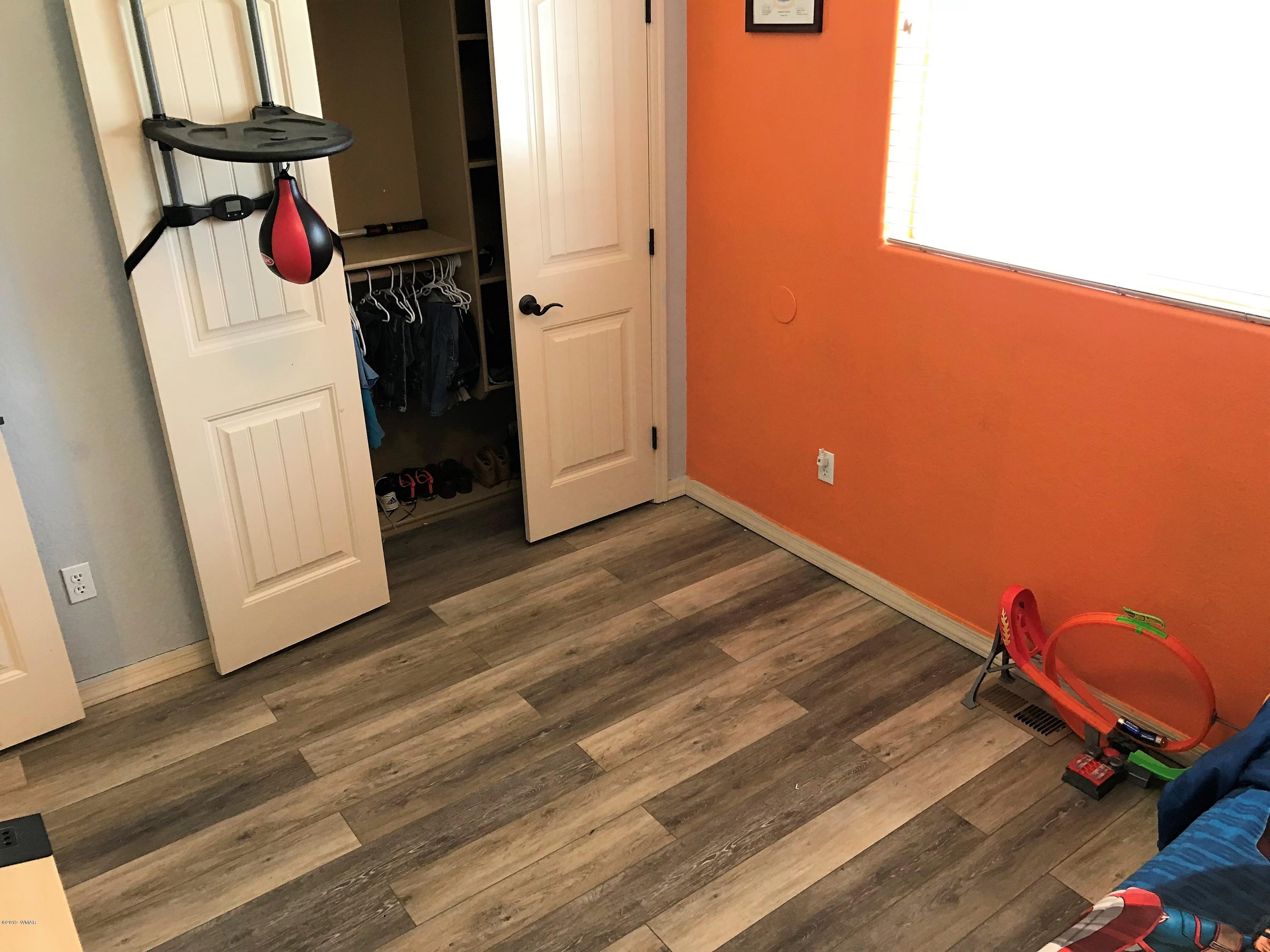 526 South 6th W Street Snowflake, AZ 85937 - Photo 31 of 36 a view of a room with wooden floor