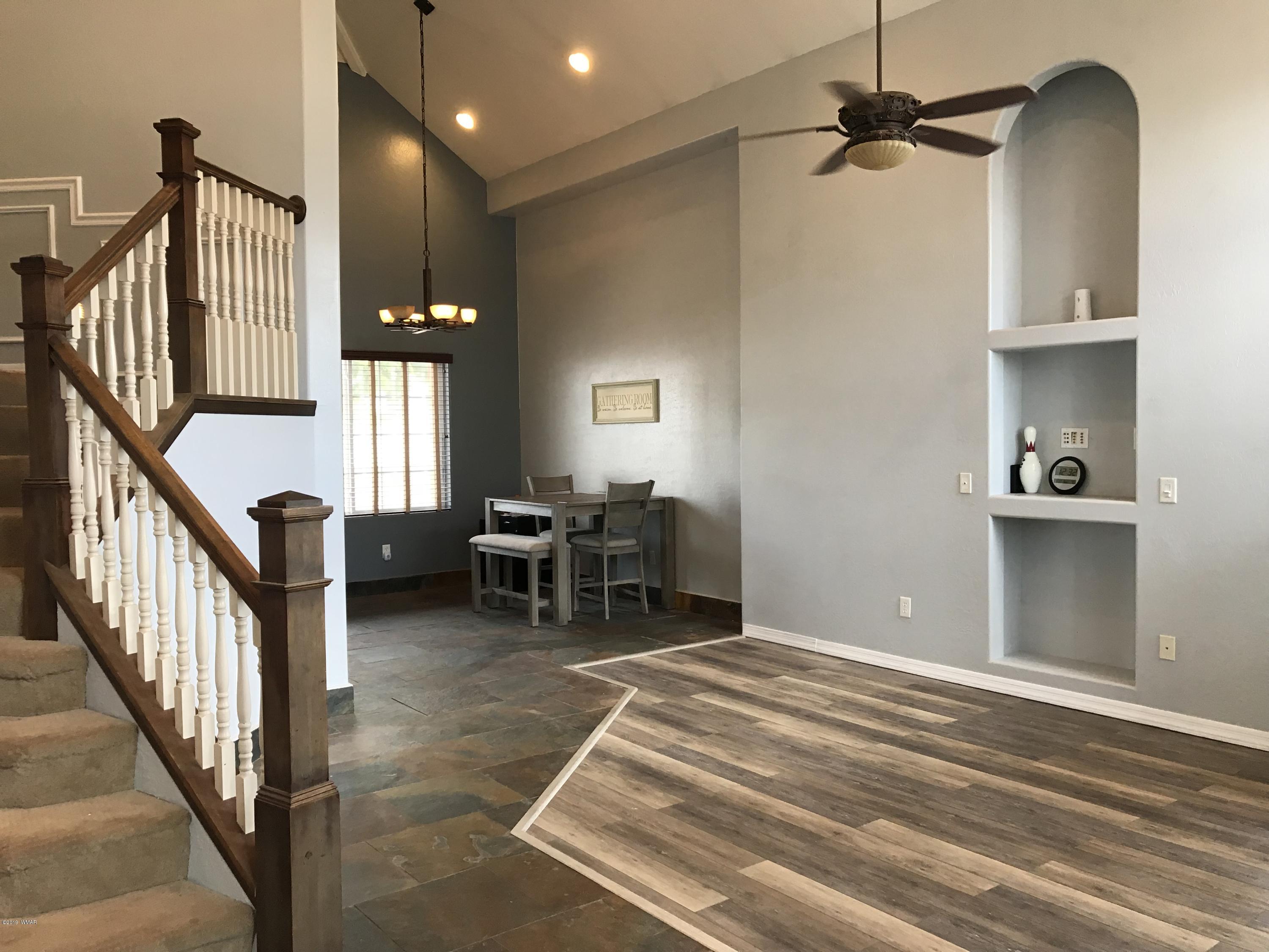 526 South 6th W Street Snowflake, AZ 85937 - Photo 10 of 36 a view of a livingroom with furniture and staircase
