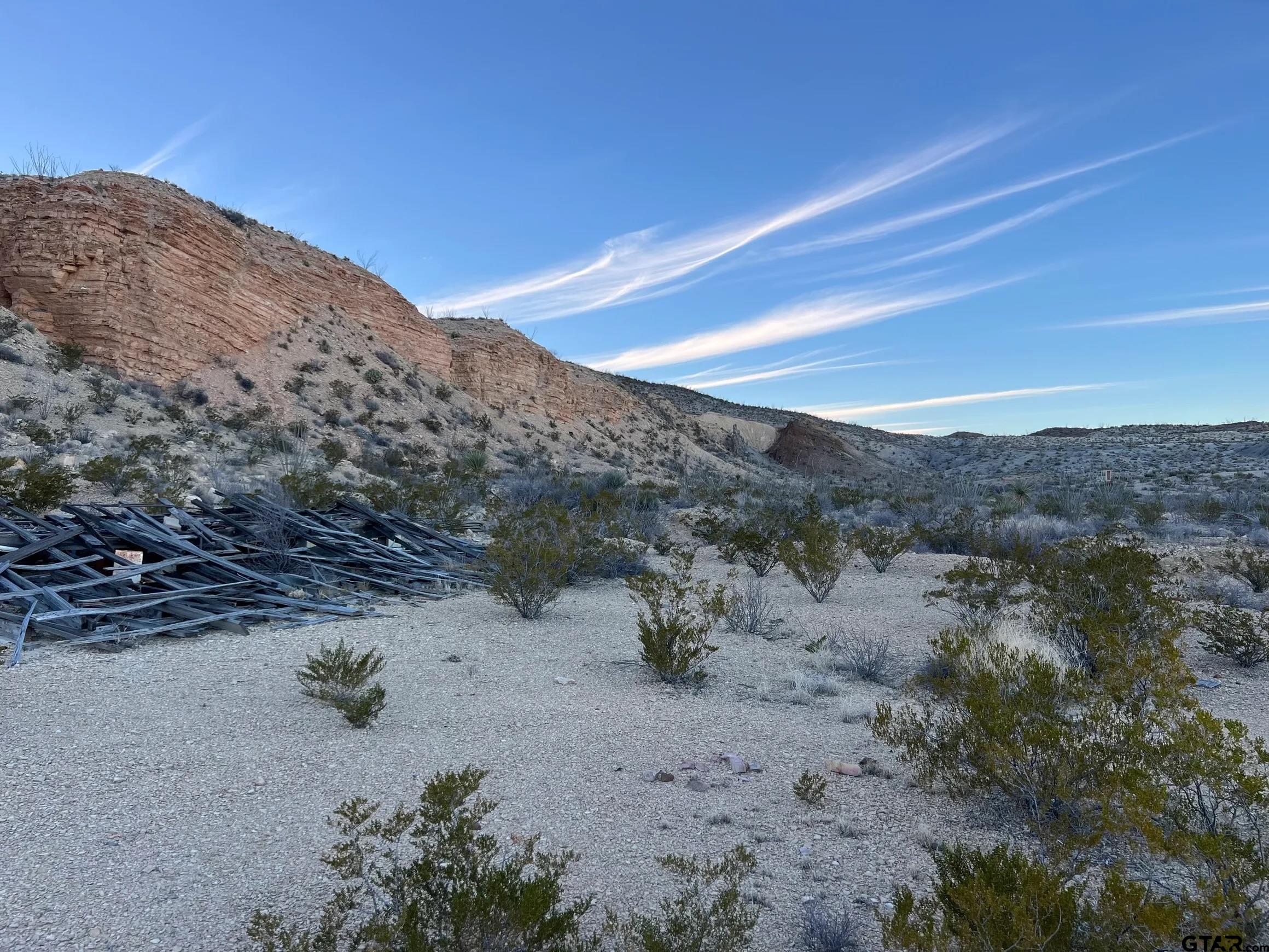 26503 Herman's Peak Road Terlingua, TX 79852 - Photo 5 of 12 a view of a road with mountains in the background