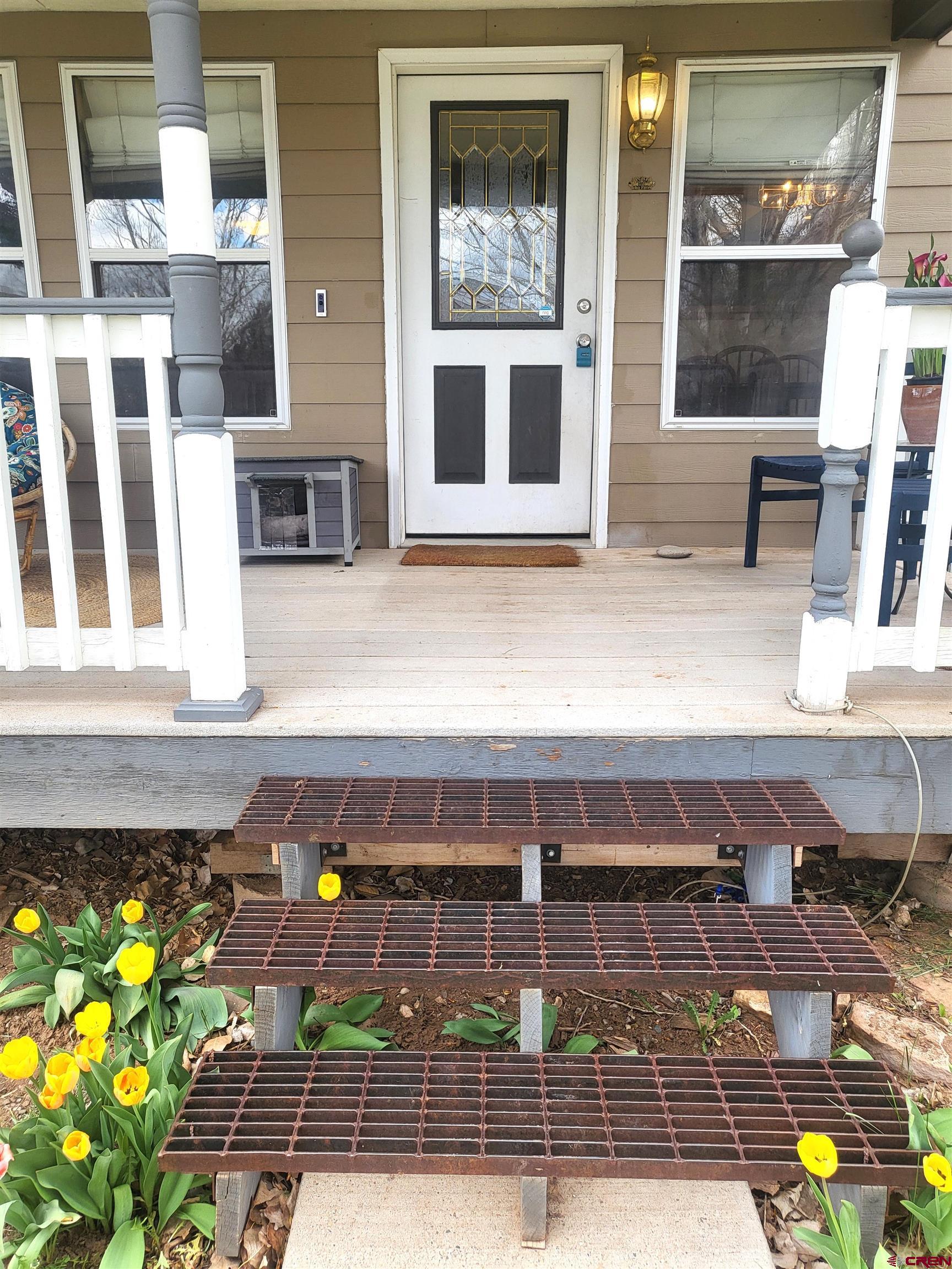 1610 Pine Street, Unit E Norwood, CO 81423 - Photo 4 of 23 a view of swimming pool with outdoor seating