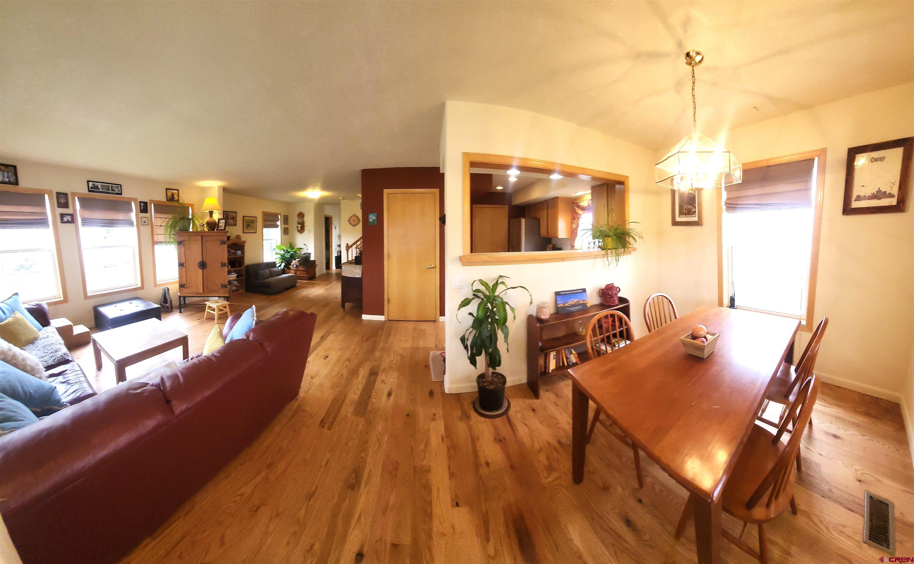 1610 Pine Street, Unit E Norwood, CO 81423 - Photo 9 of 23 a view of a living room and dining room