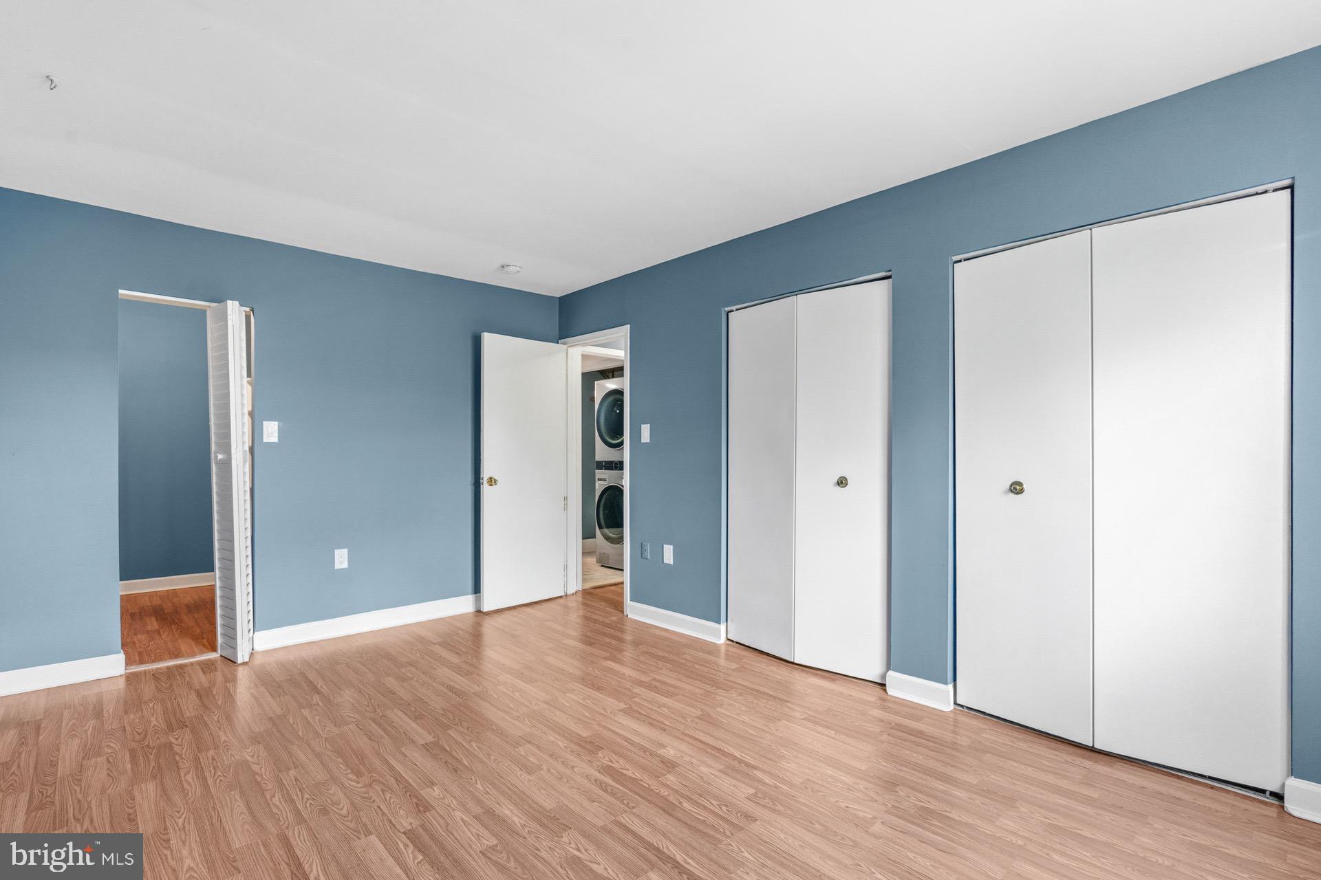 422 Girard Street, Unit 144 Gaithersburg, MD 20877 - Photo 20 of 26 a view of an empty room with wooden floor
